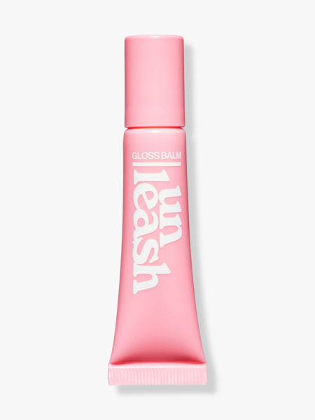 Unleashia Sunset Dazzle Gloss Balm pink lip balm on light gray background