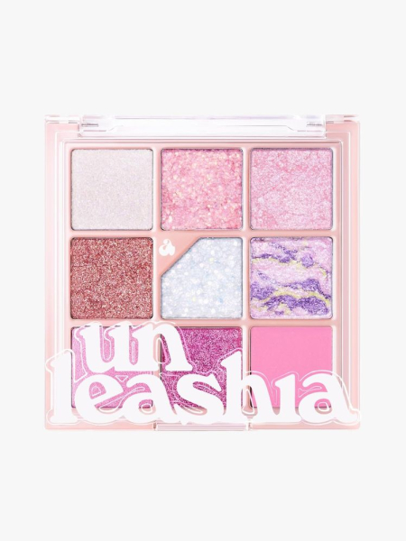Unleashia Glitterpedia Eyeshadow Palette in branded component on a light gray background